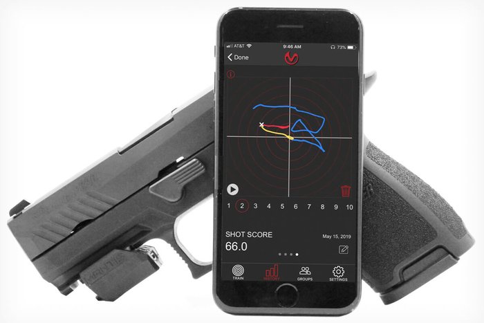 How Dry-Fire Practice Can Make You a Better Shooter - hand positioning and unloaded pistol dry-fire training photo