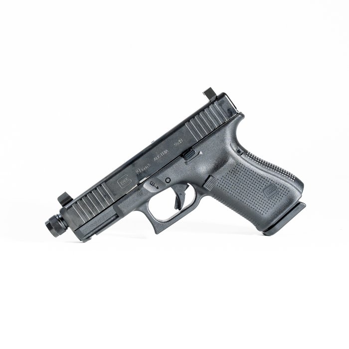Glock 19 Gen 5 with threaded barrel and suppressor-height sights—clearly represents suppressor use and aftermarket barrel/sight options discussed in the +P, Suppressors & Barrel Options section.