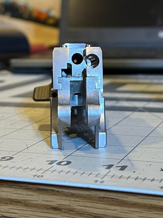 Close-up photo of a finished slide-to-frame fit showing tight tolerances and smooth mating surfaces—visual cue of solid build quality and reliability.