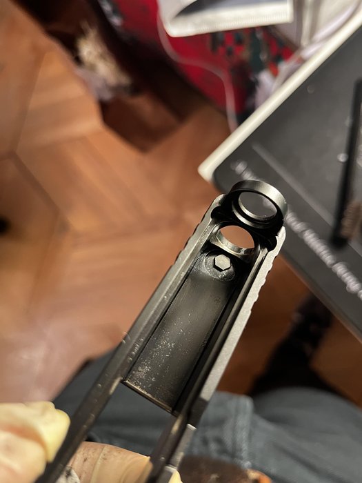 Glock inside slide wear. Is this normal? The gun is pretty new ... (close-up showing internal slide wear and metal-on-metal contact)