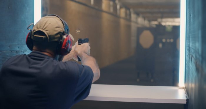 Proper Gun Range Etiquette for the Beginner — image illustrating range etiquette and safety protocols for newcomers (shooting range scene emphasizing rules and safe behavior).