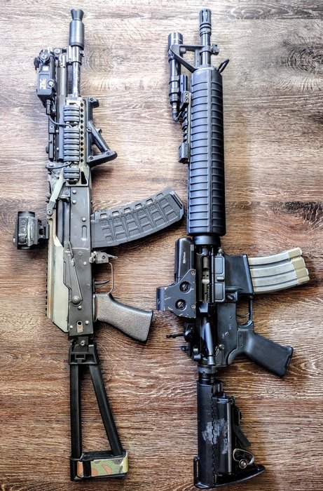 my 2 favorite 5.56s 12.5 vs 16 — side-by-side comparison of two AR-style rifles showing 12.5" and 16" barrel lengths